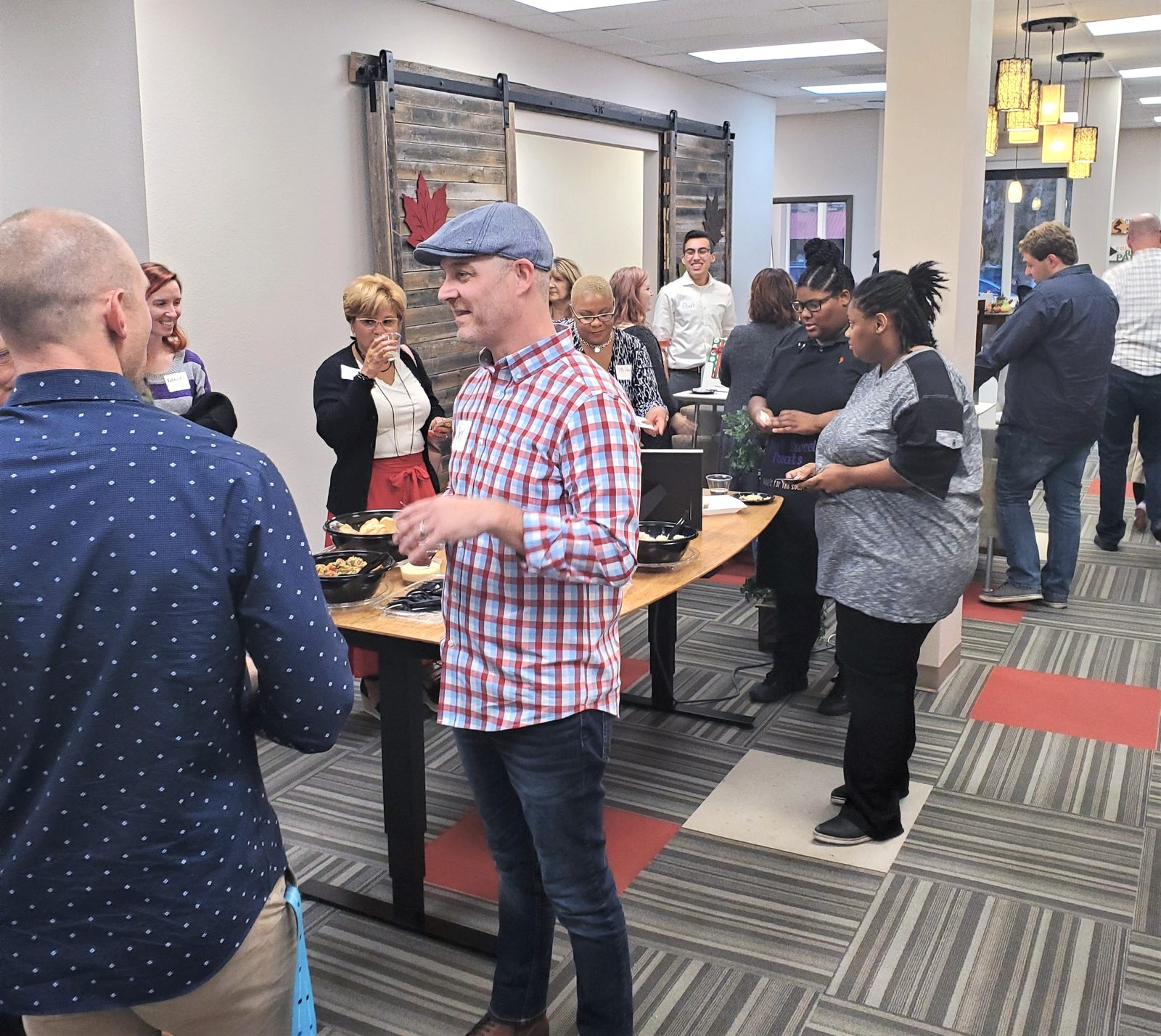 Members networking at an Ensemble Coworking event in Fort Worth