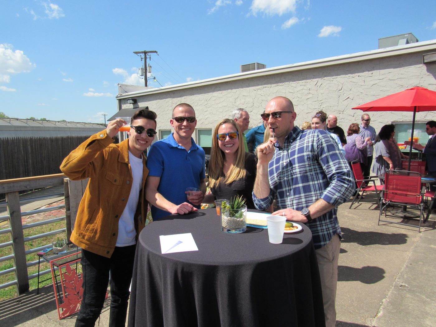 Ensemble members talking on the patio in Fort Worth