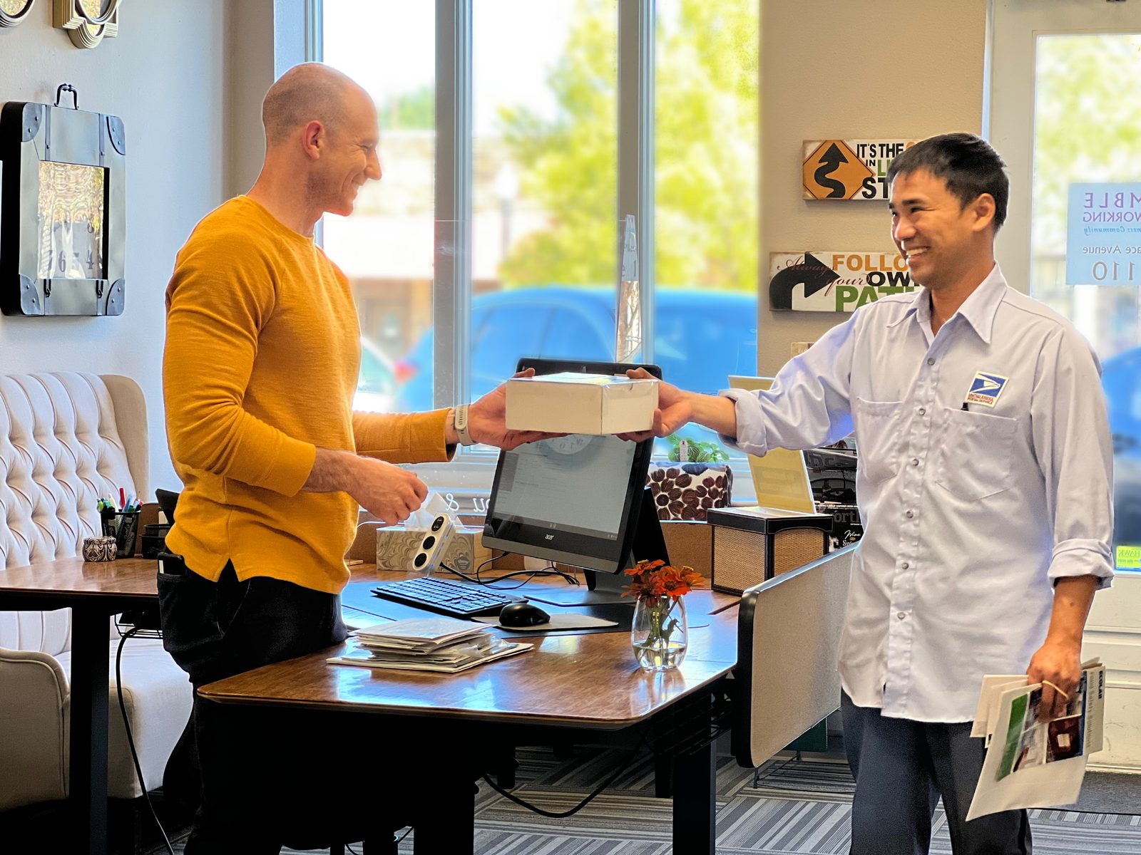 Members collecting mail at the Ensemble Coworking virtual mail center